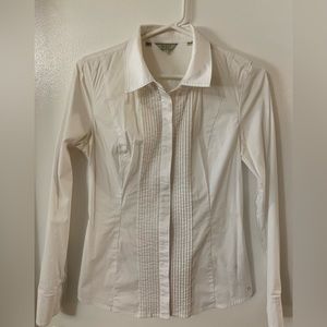 Body hugging sexy button down long sleeve Guess blouse.